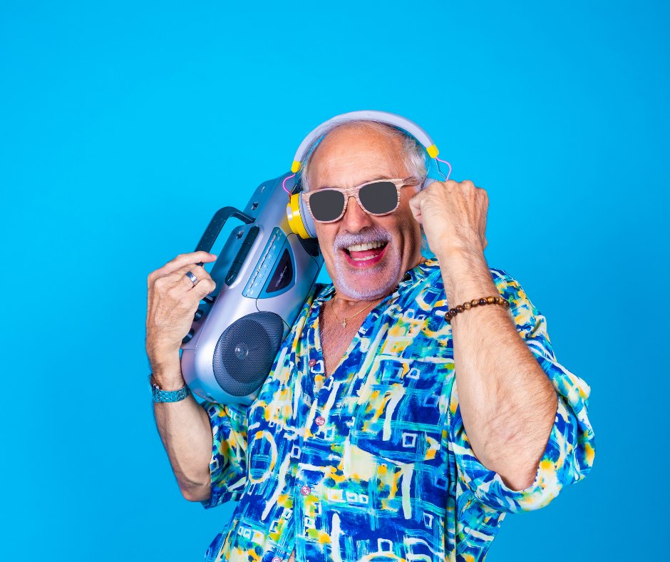A regular at a local venue dancing with a boombox and headphones
